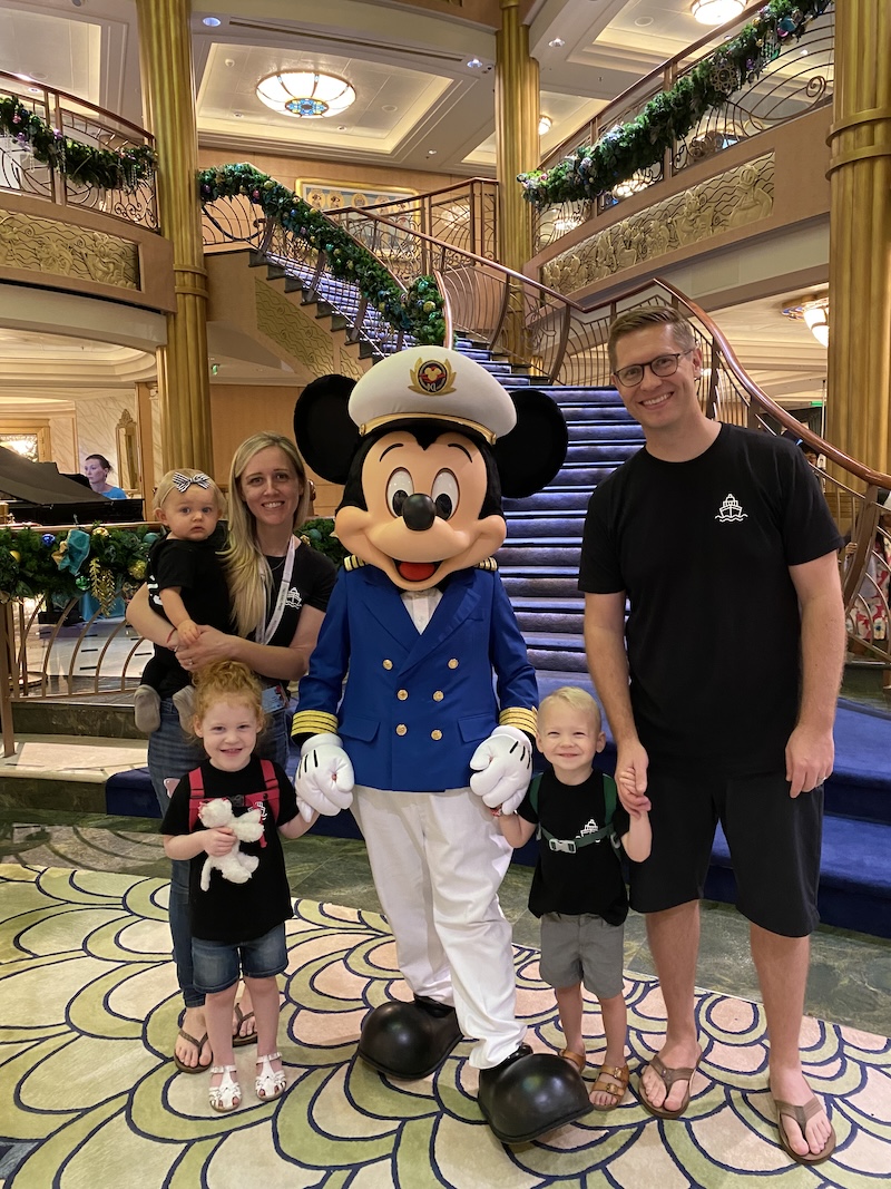 Christine and family with Captain Mickey Mouse on Disney Fantasy